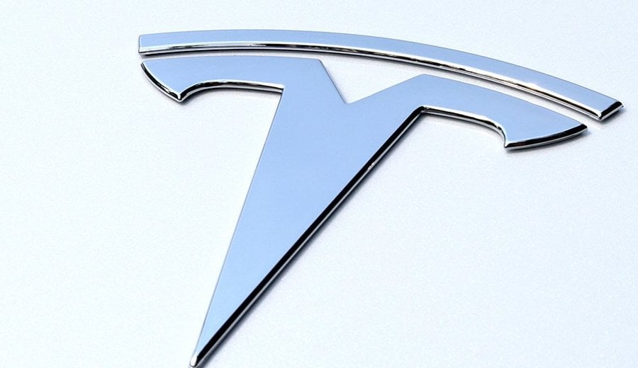 The budget-friendly Tesla is coming. Here's how much it costs
