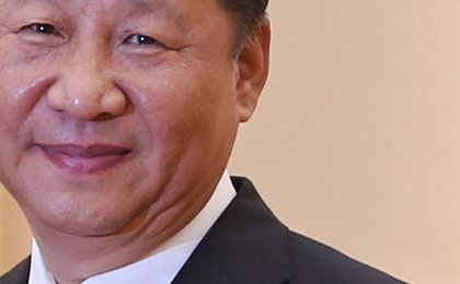 China's Xi soothes tones with US at top business meeting