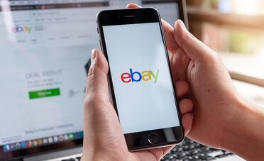 How do auctions work on eBay?
