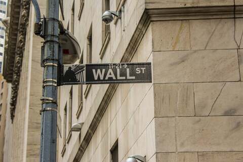 Wall Street hits record highs, but Apple, Costco, Moderna and Netflix draw negative ratings