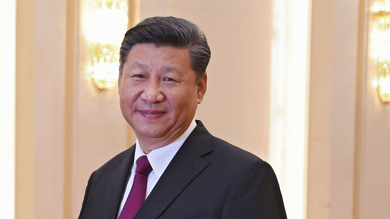 China's Xi soothes tones with US at top business meeting
